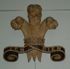Prince of Wales feathers.