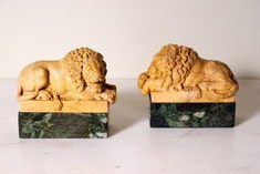 A Pair of 19th Century Grand Tour Giallo Antico marble Lions